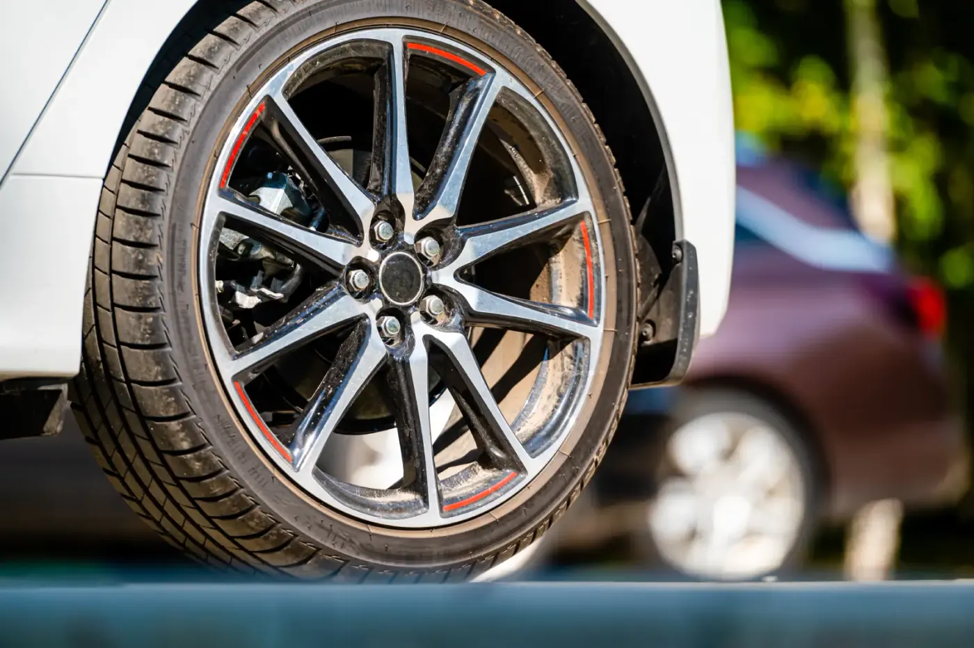 Refinished alloy wheel on a performance car